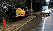  ?? COBB COUNTY ?? County crews pump water on Columns Drive after a system failure at the South Cobb Water Reclamatio­n Facility in December 2018 caused a massive sewage spill. Cobb County is taking legal action against the contractor the county says is to blame.