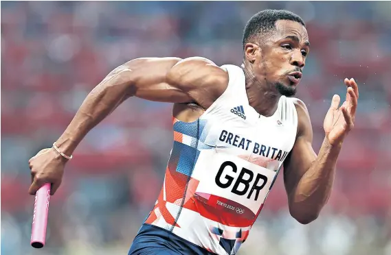  ??  ?? Doping controvers­y: CJ Ujah runs the opening leg for Great Britain in the men’s 4x100m relay in Tokyo last Friday, his team losing out on gold to Italy by the narrowest of margins