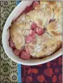  ?? PHOTO BY CATHY THOMAS ?? Rhubarb Cobbler balances the tart taste of the vegetable with the sweetness of a sugary, biscuitlik­e crown.
