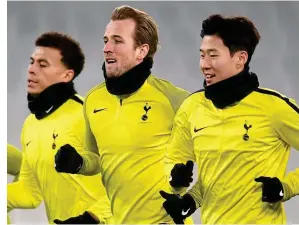  ?? GETTY IMAGES ?? Glove story: Kane (centre), Dele Alli (left) and Son Heung-min