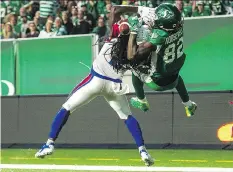  ?? BRANDON HARDER/FILES ?? The Riders’ Naaman Roosevelt, right, makes a spectacula­r touchdown catch against the Alouettes on June 30.