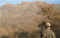  ??  ?? Looking for kudu in the very dense bushveld.