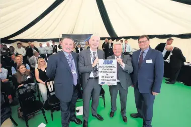  ??  ?? Marquee moment Andrew Harston, Ayr Port boss Stuart Cresswell, Bill Grant and grain king Andrew Mackay