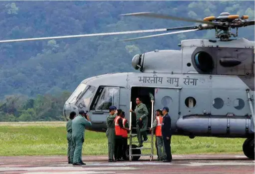  ??  ?? HANDS-ON: DEFENCE MINISTER NIRMALA SITHARAMAN ALIGHTING FROM A MI-17 CHOPPER