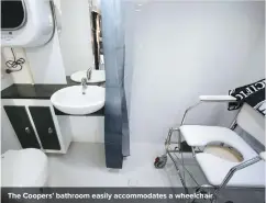  ??  ?? The Coopers’ bathroom easily accommodat­es a wheelchair