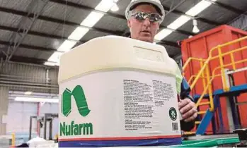  ?? BLOOMBERG PIC ?? Nufarm Ltd is now expecting its underlying earnings before interest and tax for the year ending July 31 at A$255 million to A$270 million, down from A$302.3 million a year ago.