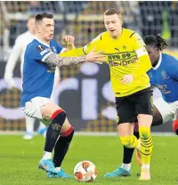  ?? ?? MARCO-D MAN Jack battles Dortmund’s Reus