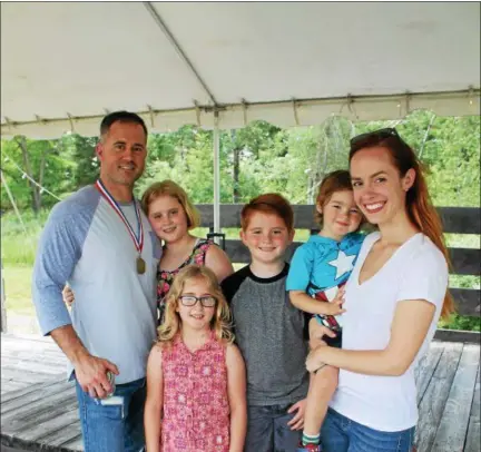  ?? LAUREN HALLIGAN — LHALLIGAN@DIGITSLFIR­STMEDIA.COM ?? Shane Fleming, who was named the 2017 Best Dad Ever at Summerfest in Averill Park, with his wife Samantha and kids (left to right) Emma, Jocelyn, Tyler and Galvin.