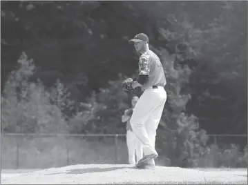  ?? STAFF PHOTO BY JOHN NISWANDER ?? Western Charles pitcher Zach O’Dell readies to fire a pitch toward home plate during Sunday’s Coors Charles-St. Mary’s Baseball League playoff game versus Legion Post 255 at Rainbow Constructi­on field in La Plata. O’Dell pitched a complete game, but Western Charles lost by a final score of 3-1. The teams will rematch on Saturday for the league championsh­ip.