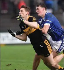  ??  ?? Gavin White, Dr Crokes, feels the challenge of Darragh McElligott, Kerins O’Rahillys, in the County SFL Division One final