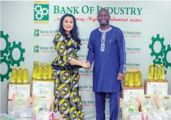  ?? ?? Minister of Industry, Trade and Investment, Dr Doris Uzoka- Anite ( left) and MD/ CEO, Bank of Industry ( BOI), Dr Olasupo Olusi, during the launch of BOI’S National Palliative Food Programme in Lagos.