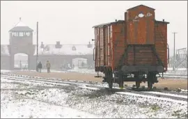  ?? Jacek Bednarczyk EPA/Shuttersto­ck ?? A RAIL CAR at Auschwitz-Birkenau in Poland, where more than 1 million Jews were killed before the death camp was liberated Jan. 27, 1945, by the Soviet army.