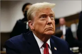  ?? YUKI IWAMURA — THE ASSOCIATED PRESS ?? Former President Donald Trump waits for the start of proceeding­s in Manhattan criminal court Tuesday in New York.