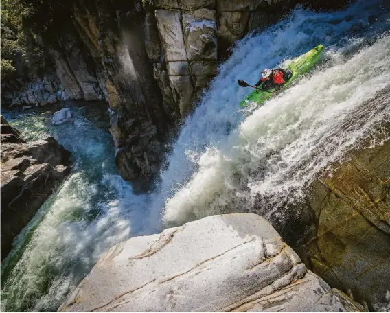  ?? Courtesy Eric Parker ?? Kayaker Scott Lindgren paddles Royal Gorge on the American River’s North Fork. “The River Runner” follows Lindgren’s sometimes unsettled life.