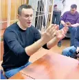  ??  ?? Opposition leader Alexei Navalny in court yesterday; right, Sunday’s protest in Moscow