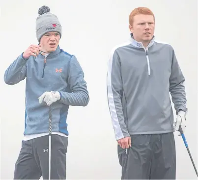  ?? Picture: Kenny Smith. ?? Michael Lawrie, left, edged out Thomas Boyd Jr in a thrilling encounter at a misty Murcar in the first round of the Scottish Boys’ Championsh­ip.