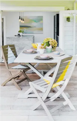  ?? Photo / Larnie Nicolson ?? Make the most of the outdoors. Rejuvenate furniture with a geometric design using colours such as these, Resene Galliano, R. Martini, R, Tasman and R. Alabaster. Project by Greer Clayton.