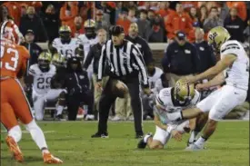  ?? RAINR EHRHARDT — ASSOCIATED PRESS ?? Pittsburgh kicker Chris Blewitt kicks the game-winning field goal in the Panthers’ 4342 win at Clemson, S.C., on Saturday.