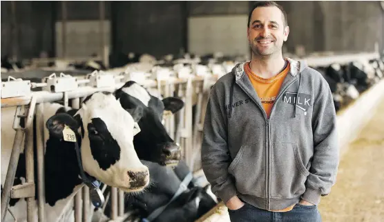  ?? IAN KUCERAK ?? Alberta dairy farmers such as Jeff Nonay have found themselves thrust into the spotlight after U.S. President Donald Trump slammed Canada for unfair competitio­n.