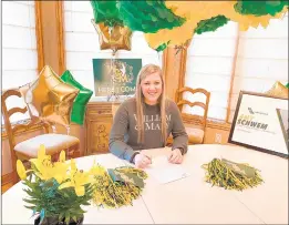  ?? PHOTO PROVIDED BY AMY SCHWEM ?? Lemont graduate Amy Schwem signs her letter of intent with William & Mary on Nov. 11, 2020.