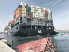  ??  ?? The damage after the Port of Karachi container ship collision last week, main picture and above