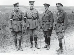  ?? TORONTO STAR FILE PHOTO ?? Sir Arthur Currie, second from left, sued the Port Hope Evening Guide for $50,000 after it accused him of sending Canadian soldiers to their deaths at the end of the war for his own glory.