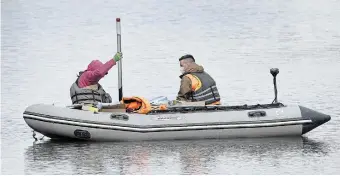  ?? CATHIE COWARD THE HAMILTON SPECTATOR FILE PHOTO ?? Technician­s check Chedoke Creek for contaminat­ion in 2021. Hamiltonia­ns are optimistic about the future and angry about the years of incompeten­ce and embarrassi­ng political scandals, Laura Babcock writes.