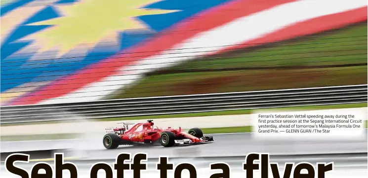  ?? — GLENN GUAN / The Star ?? errari’s e astian ette spee ng away ur ng t e first practice session at the Sepang Internatio­nal Circui yesterday, ahead of tomorrow’s Malaysia Formula One Grand Prix.