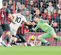  ??  ?? Waiting game: Marcus Rashford scores United’s winner