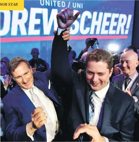  ?? FRANK GUNN / THE CANADIAN PRESS ?? Andrew Scheer, right, is the new leader of the federal Conservati­ve Party after his upset win over Maxime Bernier on Saturday.