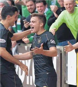  ?? Photograph: SNS ?? after scoring Celtic’s third of the day