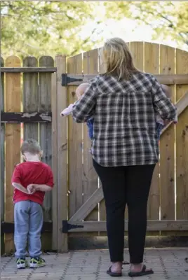  ?? PHOTOGRAPH BY GARY YOKOYAMA, THE HAMILTON SPECTATOR ?? Linda is raising her son’s newborn twin daughters and four-year-old son because he and his girlfriend (their mother) both struggle with opioid addictions. He is currently in jail.