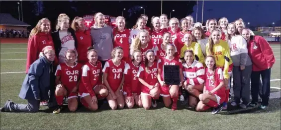  ?? AUSTIN HERTZOG — DIGITAL FIRST MEDIA ?? The Owen J. Roberts girls soccer team celebrates its Pioneer Athletic Conference championsh­ip game win over Spring-Ford Thursday night.