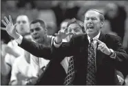  ?? JOHN GAPS III, FILE/AP PHOTO ?? This March 13, 1998, file photo shows TCU head coach Billy Tubbs, front, and assistant coach Steve McClain shouting instructio­ns to their players during their opening-round game in the NCAA Midwest Regional in Oklahoma City.