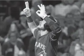  ?? MICHAEL DWYER, THE ASSOCIATED PRESS ?? Toronto BlueJays’ Josh Donaldson celebrates a home run against theBoston Red Soxin September.