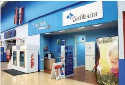  ??  ?? CoxHealth operates five in-store clinics such as this one in Springfiel­d, Mo., in space it rents from Wal-Mart.