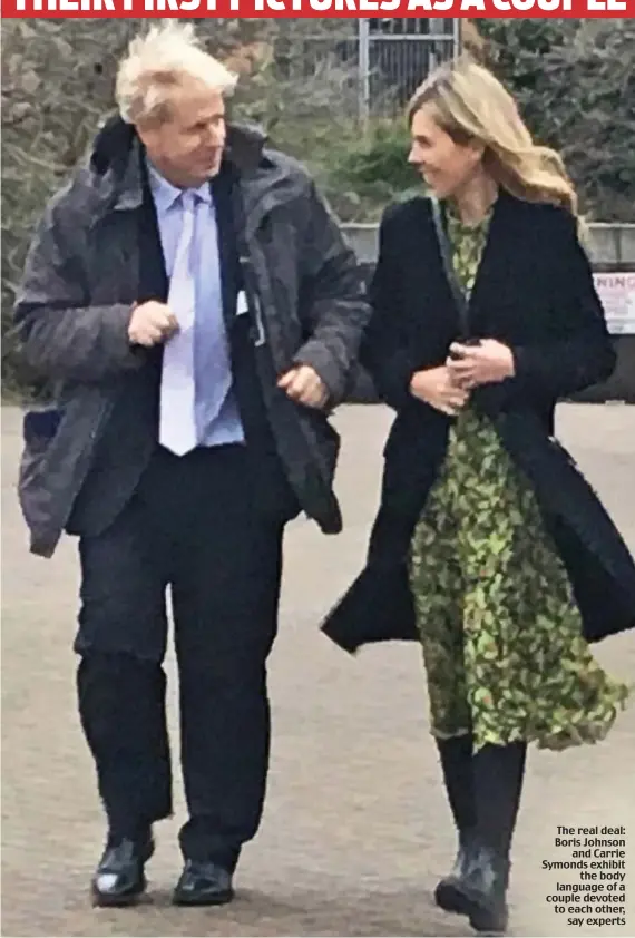  ??  ?? The real deal: Boris Johnson and Carrie Symonds exhibit the body language of a couple devoted to each other, say experts