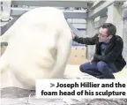  ??  ?? &gt; Joseph Hillier and the foam head of his sculpture