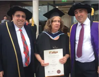  ??  ?? Fine Art Student Margie Dunne with IT Sligo Registrar Colin McLean and President Brendan McCormack at Graduation Day at IT Sligo