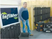  ?? (Courtesy) ?? CEO YUVAL TAMIR displays products made from his company’s InfiMer plastic.