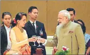  ?? AP ?? Myanmar's State Counsellor Aung San Suu Kyi offers a toast to Prime Minister Narendra Modi during a dinner at the presidenti­al palace in Nay Pyi Taw on Tuesday.