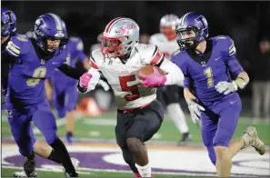  ?? BEA AHBECK/NEWS-SENTINEL ?? Above: Tokay's Alan Becerril (8) and Colby Baker (1) pursue Lincoln's Jonah Coleman at Hubbard Field on Friday. Below: Tokay's Quinn Carter (17) is tackled by Lincoln's Maceo Frisco.