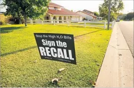  ?? Christina House For The Times ?? A SIGN in front of a Yorba Linda home calls for the recall of two water district board members. Recall petitions qualified Thursday, the registrar of voters said.