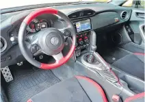  ??  ?? The 86 GT SE’s red and black interior colour scheme is a classic way to say “this can go fast.”