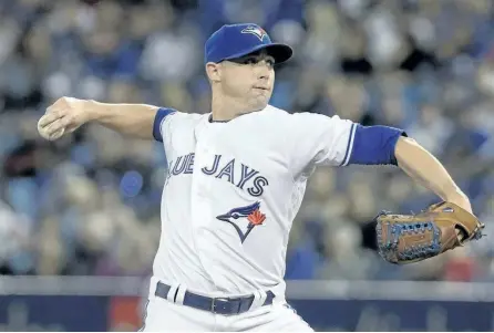  ?? CANADIAN PRESS FILES ?? Toronto Blue Jays pitcher Aaron Sanchez throws against the Baltimore Orioles in a game on April 14 in Toronto. The pitcher felt good after a bullpen session Sunday and hopes to return soon to a depleted Toronto rotation.