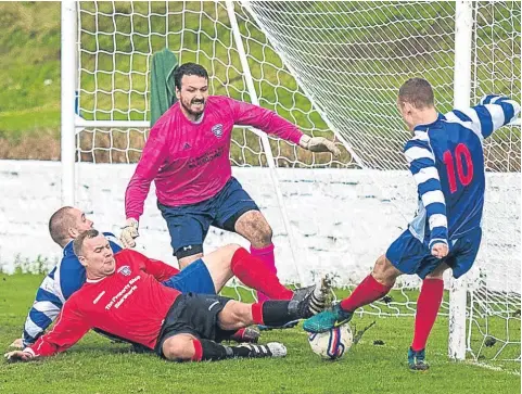  ??  ?? Connor McLeod bundles in a cross at the back post to put Violet 2-0 up against Blairgowri­e at Glenesk. The Pansies won 4-1.
