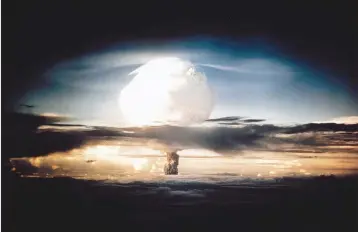  ??  ?? Thermonucl­ear dawn A 10.4-megaton device, codenamed Ivy Mike, is detonated by the US on 1 November 1952 at Enewetak Atoll in the South Pacific. It was the world’s first thermonucl­ear test and made Britain’s own recently acquired nuclear bomb seem puny by comparison