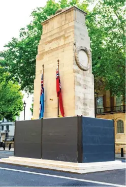  ??  ?? Protective hoardings have been placed around the national war memorial on Whitehall ahead of a planned march today.
During last weekend’s protests a woman climbed on to the monument and tried to set light to a Union flag before being removed by riot police. THE CENOTAPH