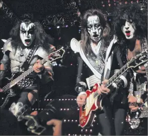  ?? Times Union Photo by James Goolsby ?? Kiss rocks out at SPAC in 2000 tour during the band’s farewell tour with its original lineup.