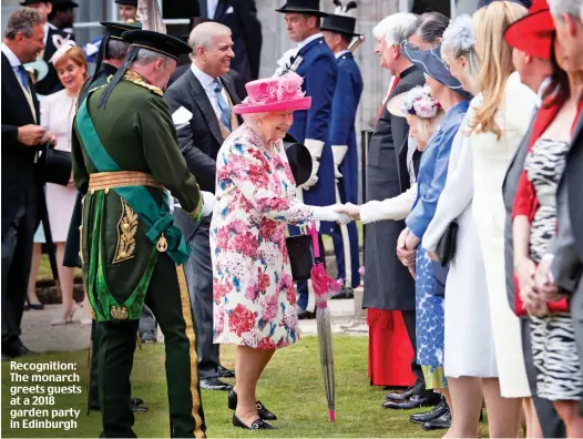  ?? ?? Recognitio­n: The monarch greets guests at a 2018 garden party in Edinburgh